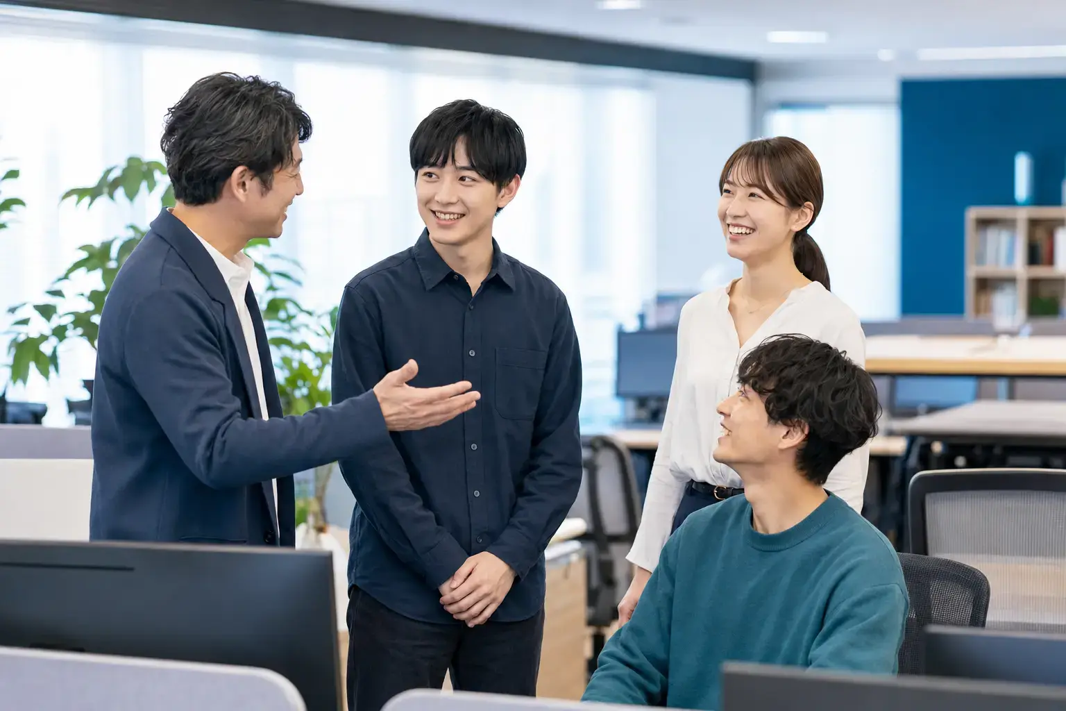 Team welcoming a new software employee